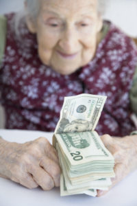 Elderly Lady with Money - purchased on iStock mgdonohue