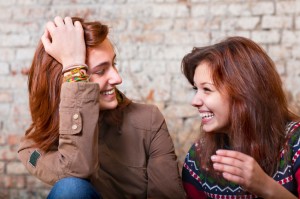 Female Friends Laughing - iStock