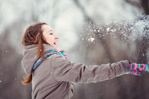Teenage girl enjoying winter - iStock