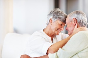 Older Couple Embracing - iStock