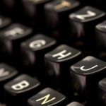 Close up of vintage typewriter machine - iStock