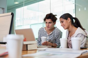 Man & Woman at Laptop - iStock