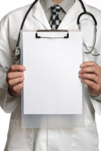 Dr with clip board - iStock